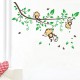 Monkeys on flowering tree wall decal