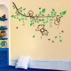 Monkeys on flowering tree wall decal